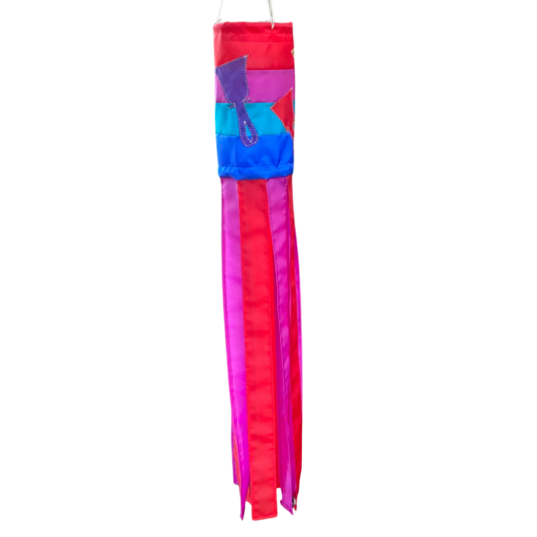 Handcrafted Handbell Windsock with red, magenta, turquoise, purple, and royal blue sections on a white background